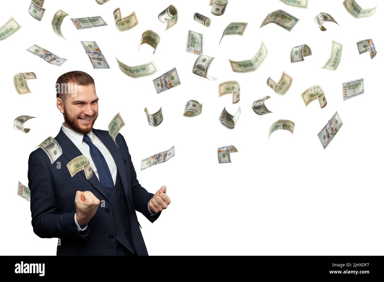 Erfolgreicher Geschäftsmann mit fallendem Dollar Cash Money isoliert auf weißem Hintergrund Stockfoto