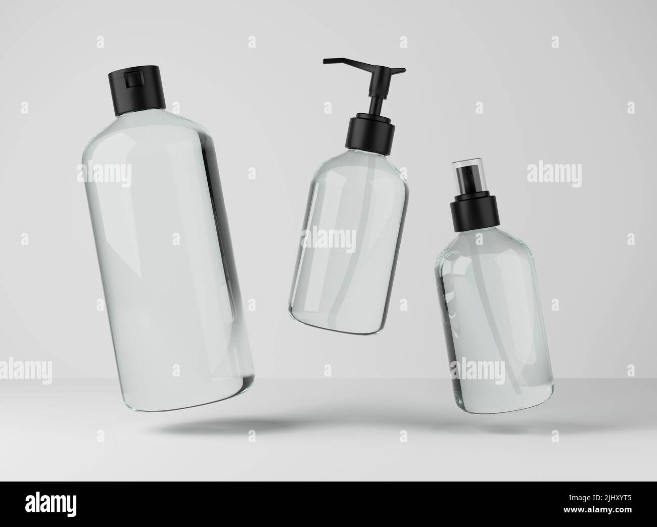 Drei verschiedene transparente Glasflaschen für Haar- und Körperpflegeprodukte 3D Render, Set aus schwimmenden Kosmetikbehältern auf grauem Studiohintergrund Stockfoto