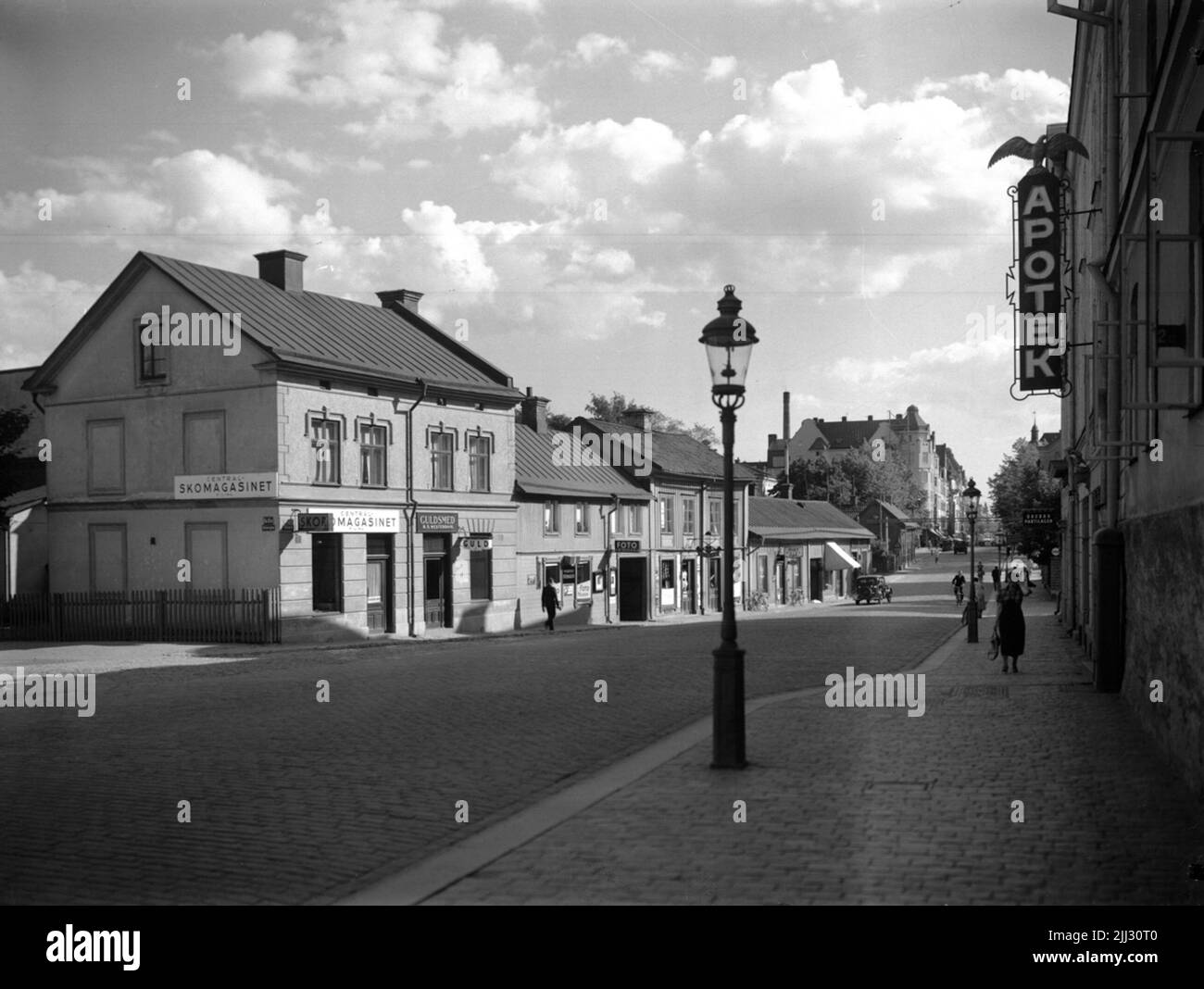 Drei zweistöckige Wohngebäude und ein einstöckiges Wohngebäude. Storgatan südlich von Strömmersgatan. Stockfoto