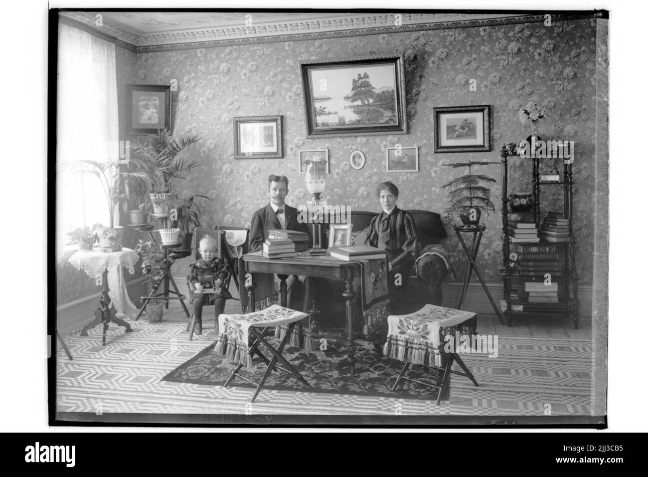 Zimmereinrichtung, Familie 3 Personen.Johan Werner Stockfoto