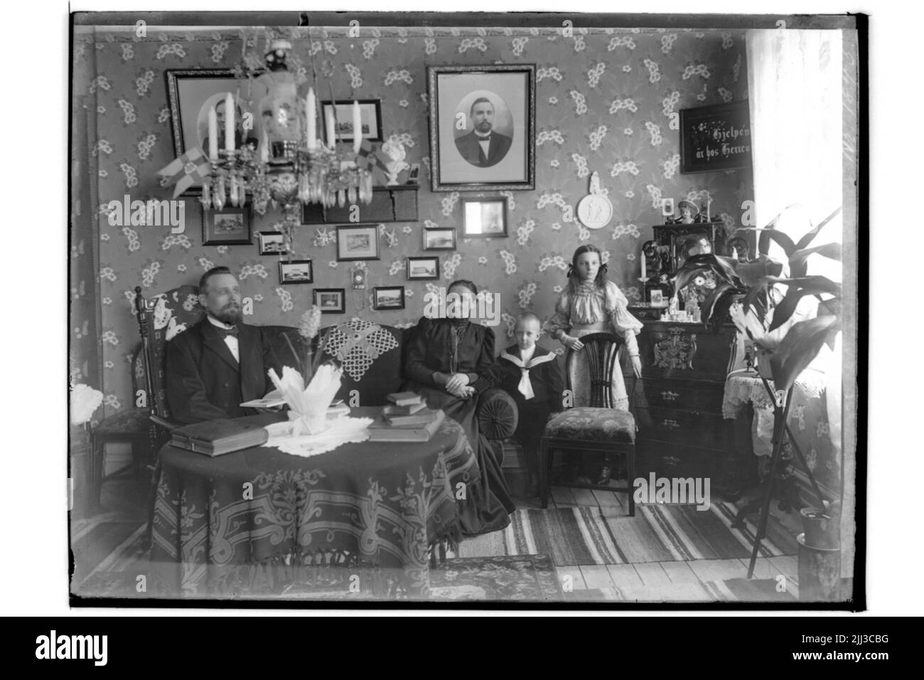 Zimmer Interieur, Familie 4 Personen. G. Nyrén Stockfoto