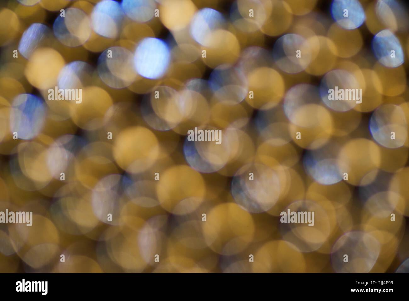 Das goldene Licht Bokeh Hintergrund Stockfoto