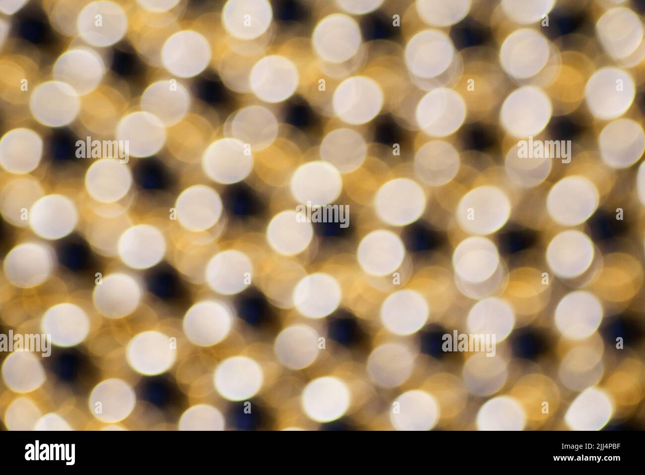 Das goldene Licht Bokeh Hintergrund Stockfoto