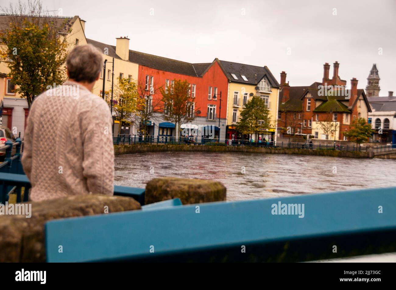 Fischer stricken Pullover und Rockwood Parade auf dem Fluss Garavogue in Sligo, Nordwestirland. Stockfoto