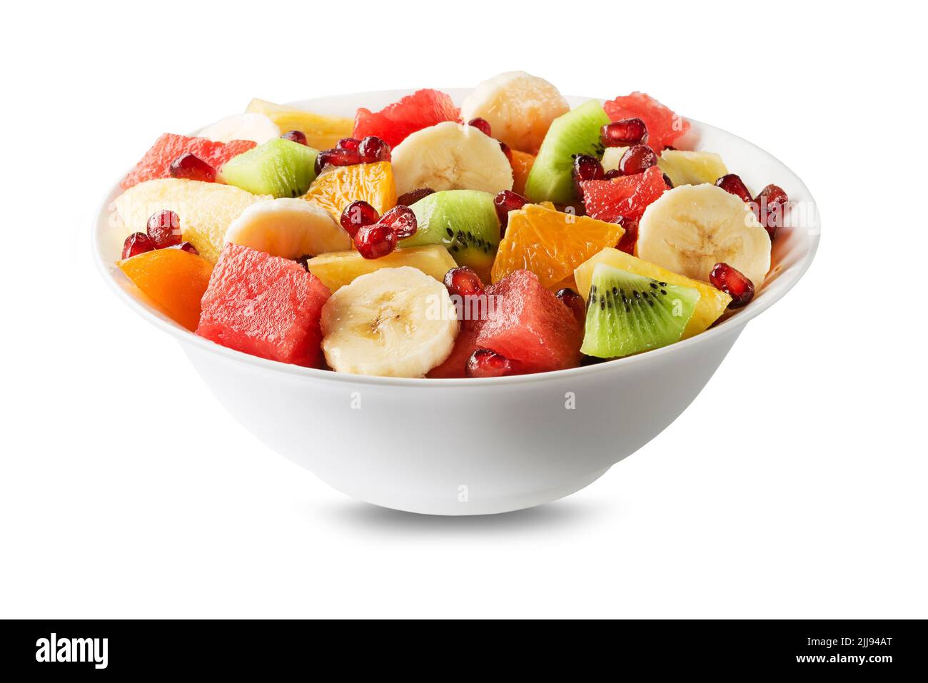 Schüssel mit gesunden frischen gemischten Obstsalat auf weißem Hintergrund isoliert Stockfoto