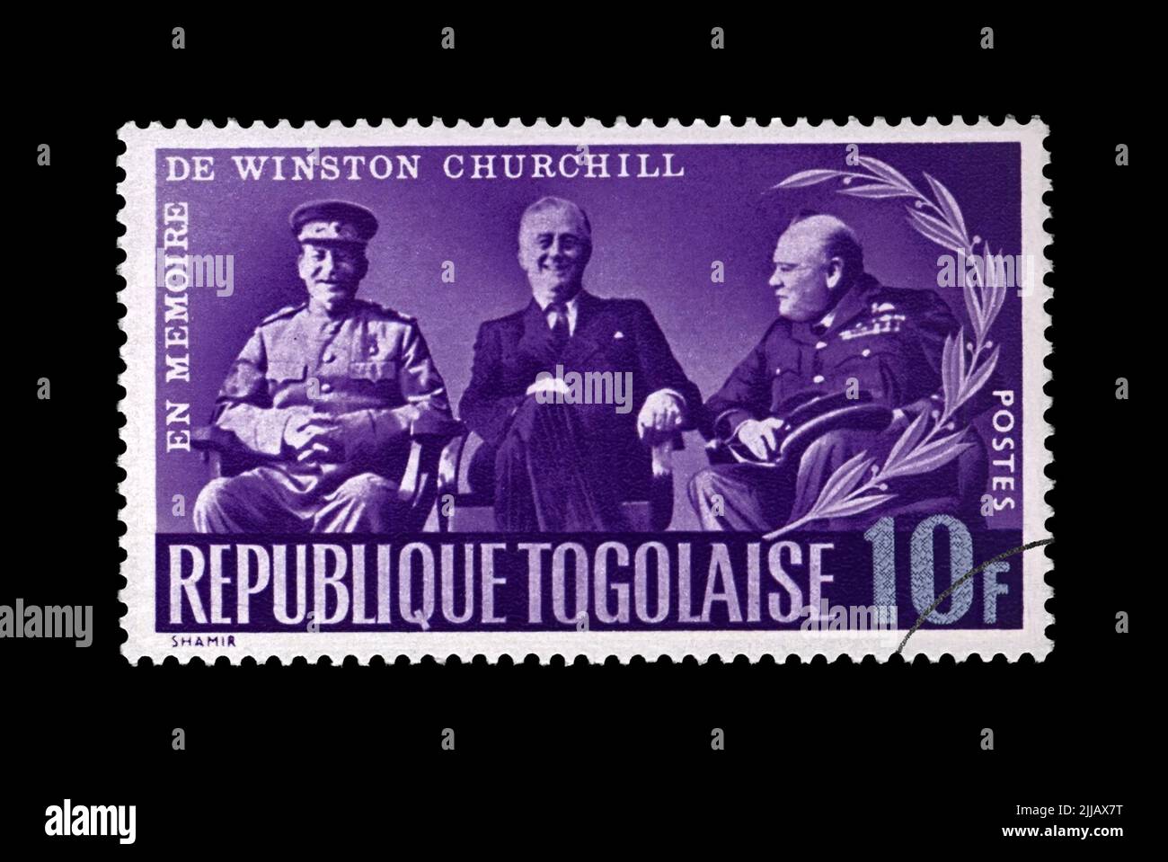 Jalta-Konferenz während des Zweiten Weltkriegs Stalin, Roosevelt und Churchill. Abgesagte Vintage-Briefmarke gedruckt in Togo, um 1965. Stockfoto