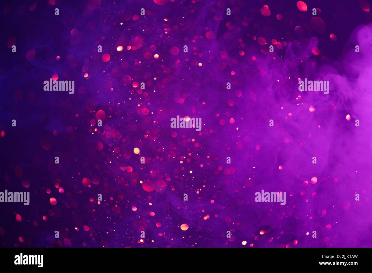Bunte Rauchwolken und glänzende Glitzer Lichter Bokeh abstrakten Fantasy-Hintergrund Stockfoto