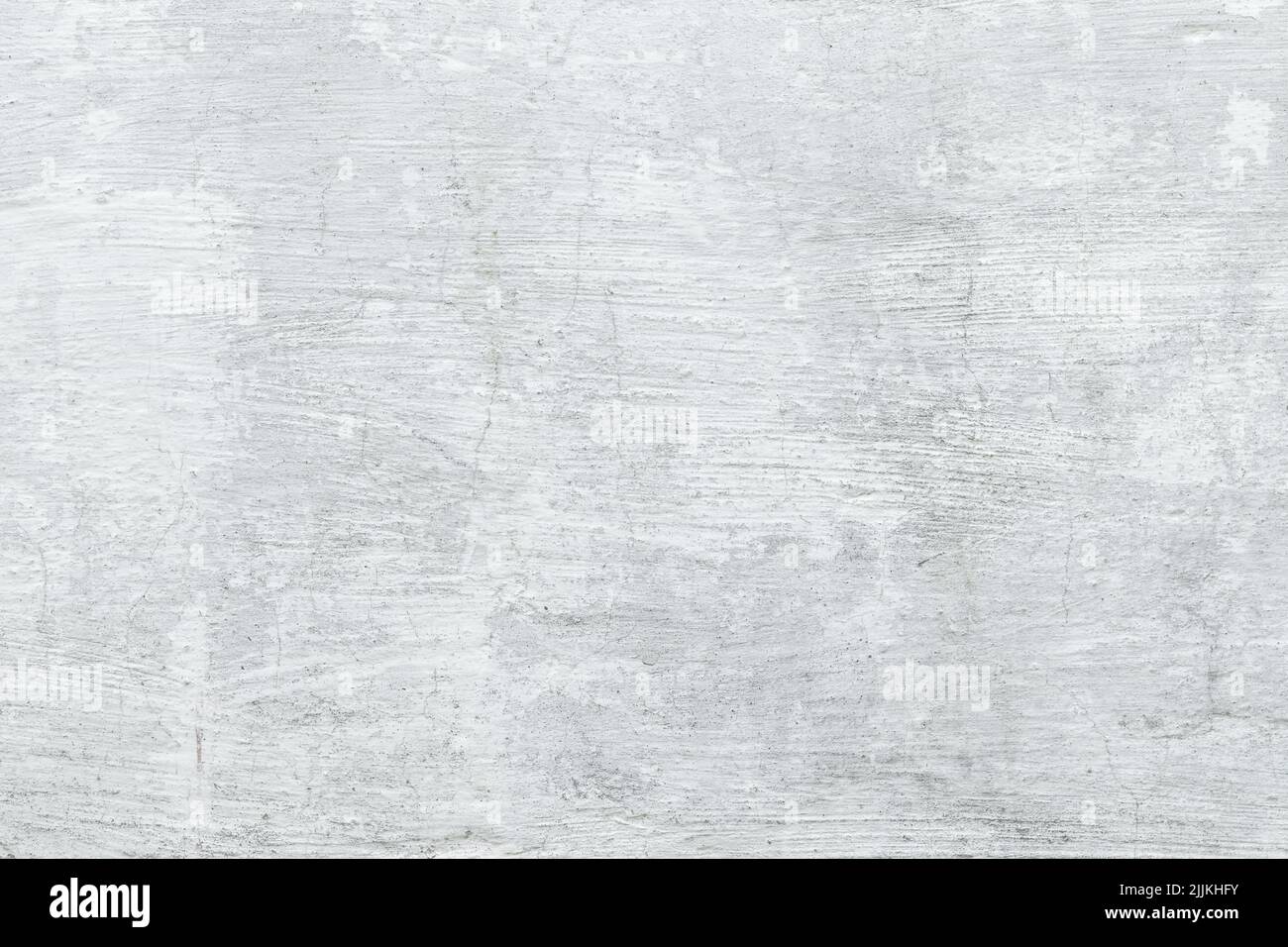 Natürliche graue Betonwand, hellgrauer Grunge-Hintergrund, alte raue Foto-Beton-Textur. Boden mit verwitterten Granitplatten. Leerzeichen. Oberfläche der Zementwand Stockfoto