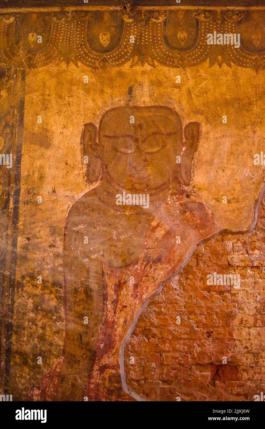 Ein religiöses Gemälde an der Wand in einem buddhistischen Tempel in Burma Stockfoto