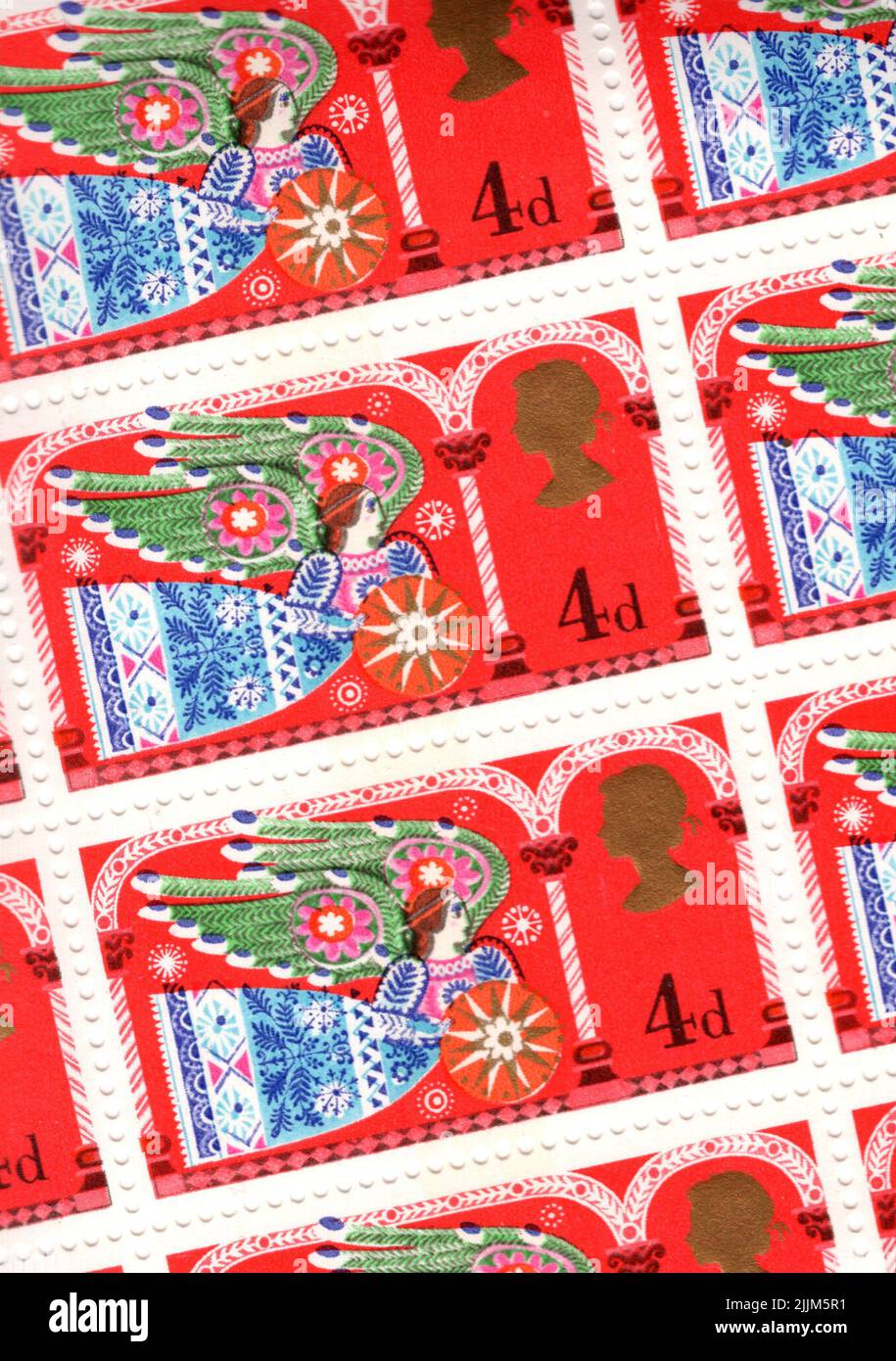 Detail aus einem Blatt mit Vintage-GB-Marken mit Weihnachten. Stockfoto