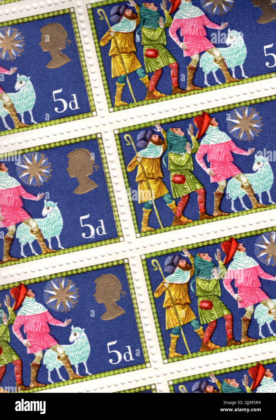 Detail aus einem Blatt mit Vintage-GB-Marken mit Weihnachten. Stockfoto