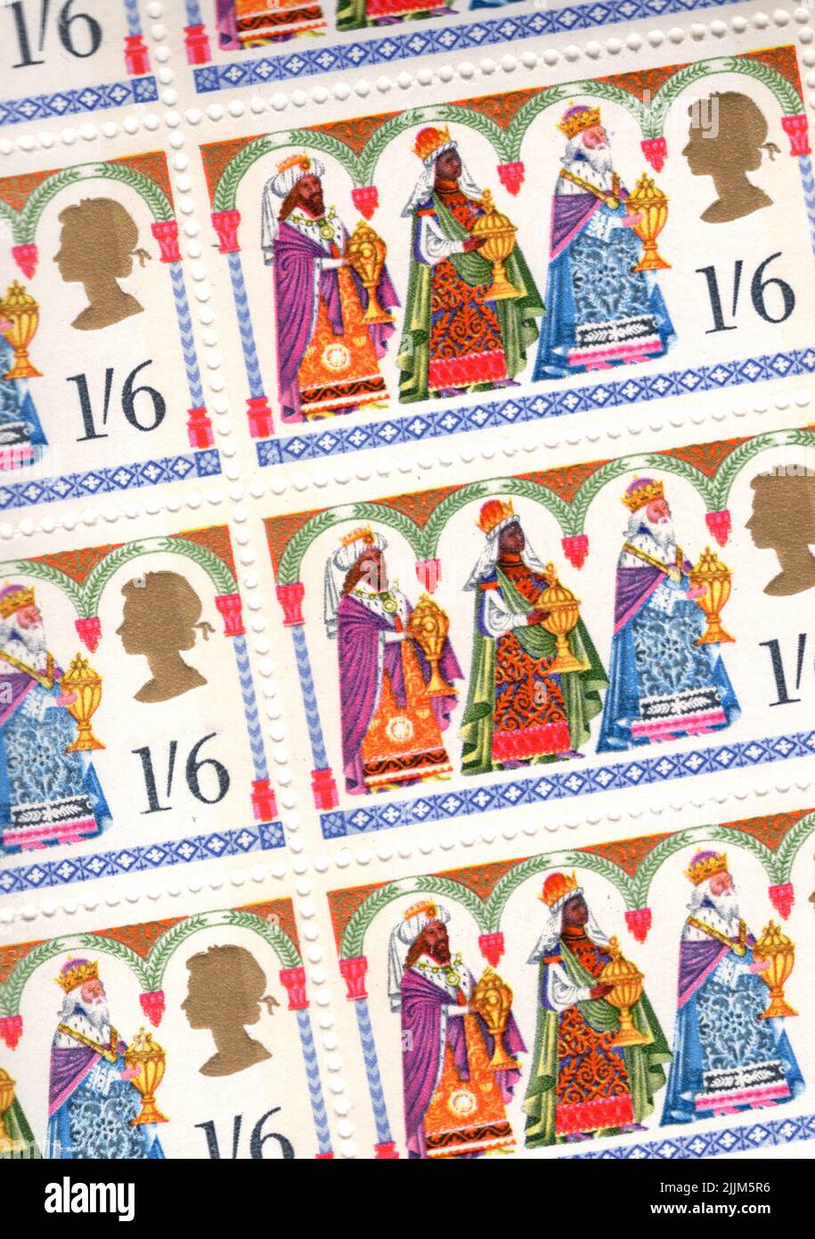 Detail aus einem Blatt mit Vintage-GB-Marken mit Weihnachten. Stockfoto