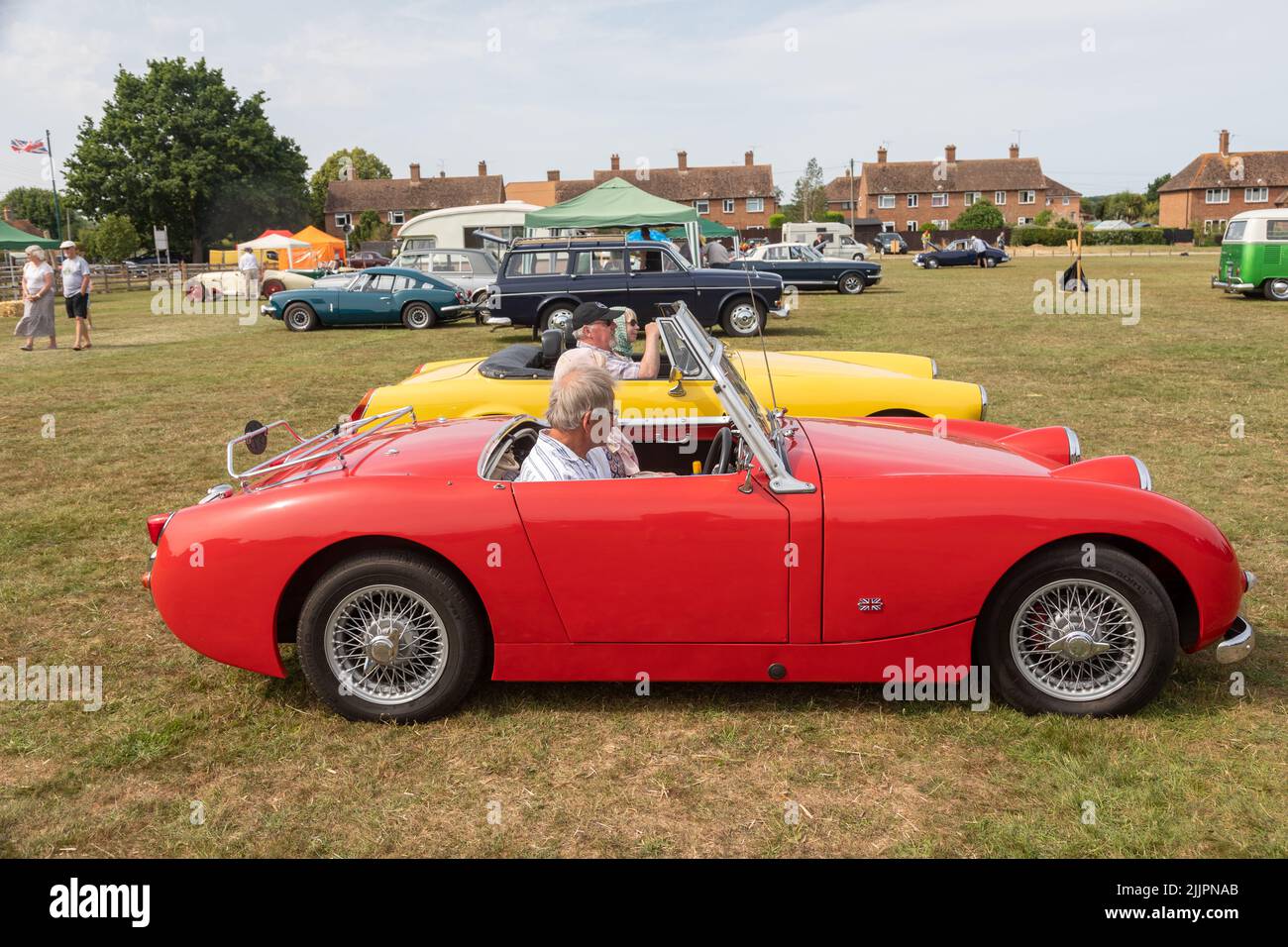 Ein MG Midget und ein Austin Healey Frog Eyed Sprite im Appledore Classic Car ShowKent Stockfoto