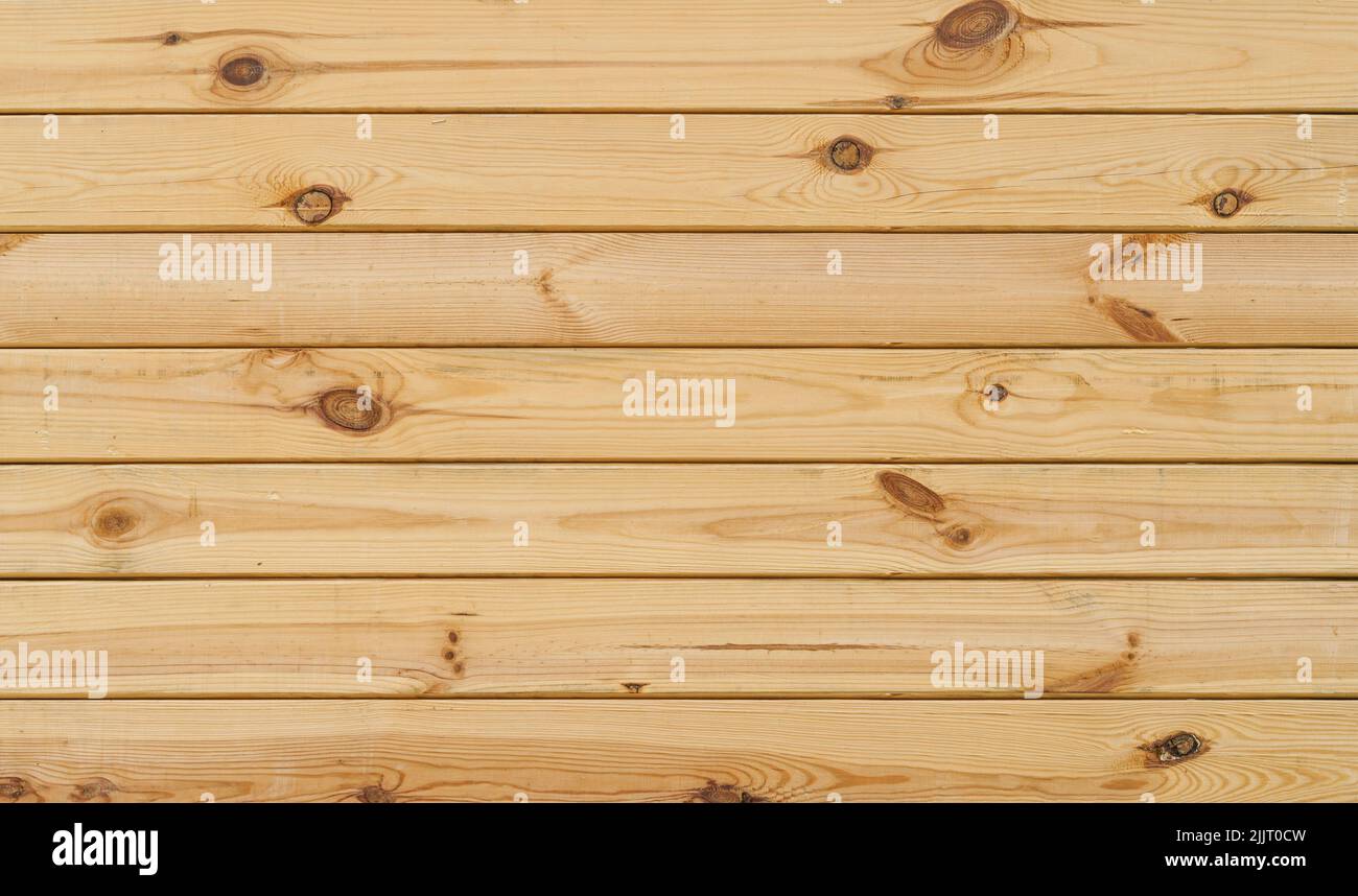 Holzbohlen Hintergrundwand. Strukturierte Holzvertäfelung für Wände, Innenräume und Bauwesen. Hochwertige Fotos Stockfoto
