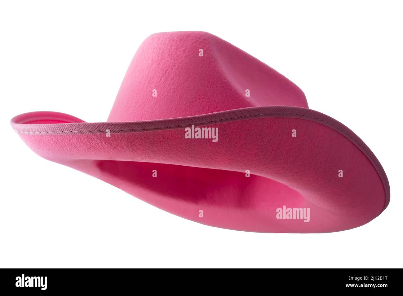Pink Cowboy Hut isoliert auf weißem Hintergrund mit Clipping Pfad Ausschnitt Konzept für weibliche westliche Kleidung, sanfte Weiblichkeit, amerikanische Kultur und f Stockfoto