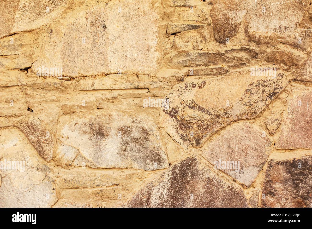 Die Textur der Steinmauer. Hintergrundstruktur der Steinmauer des alten Gebäudes. Steinmauer als Hintergrund oder Textur. Stockfoto Die Textur der Steinmauer. Hintergrundstruktur der Steinmauer des alten Gebäudes. Steinmauer als Hintergrund oder Textur. Stockfoto
