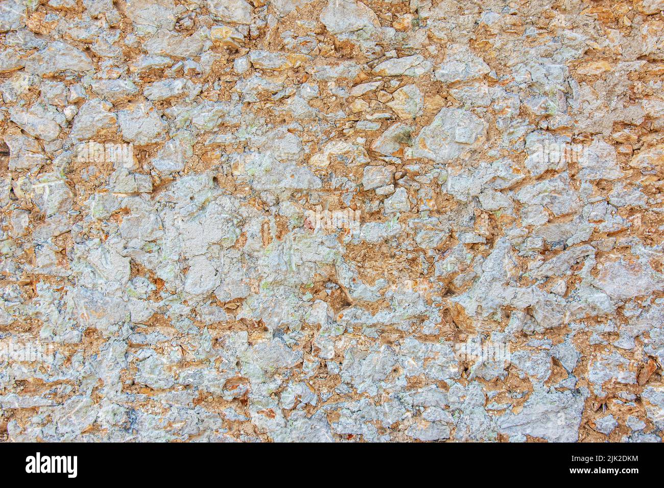 Die Textur der Steinmauer. Hintergrundstruktur der Steinmauer des alten Gebäudes. Steinmauer als Hintergrund oder Textur. Stockfoto Die Textur der Steinmauer. Hintergrundstruktur der Steinmauer des alten Gebäudes. Steinmauer als Hintergrund oder Textur. Stockfoto
