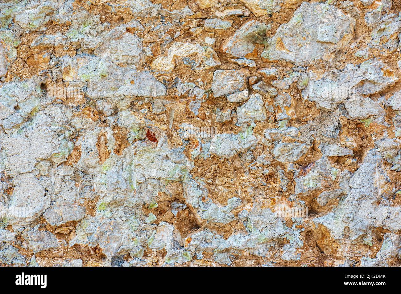 Die Textur der Steinmauer. Hintergrundstruktur der Steinmauer des alten Gebäudes. Steinmauer als Hintergrund oder Textur. Stockfoto Die Textur der Steinmauer. Hintergrundstruktur der Steinmauer des alten Gebäudes. Steinmauer als Hintergrund oder Textur. Stockfoto