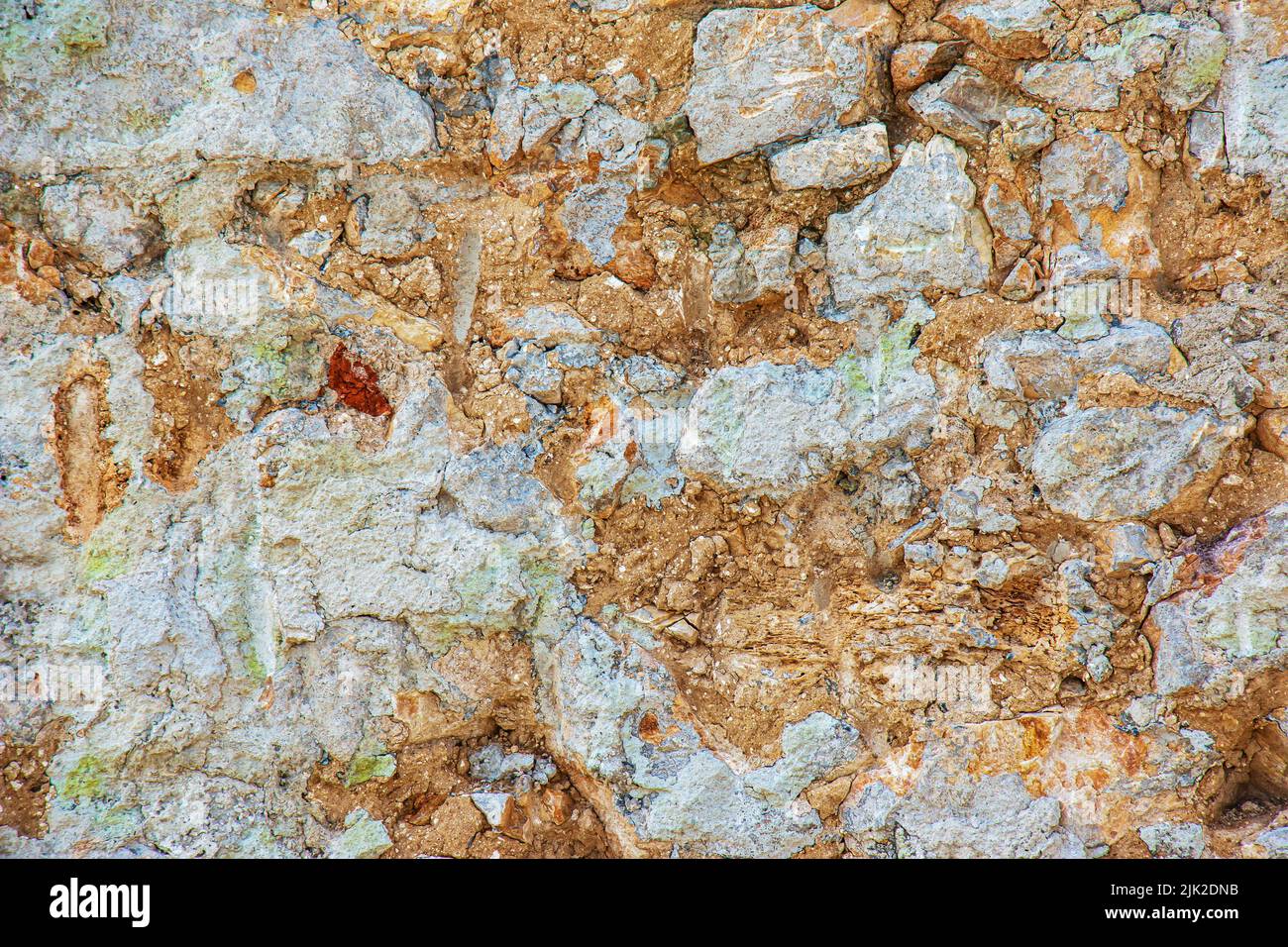 Die Textur der Steinmauer. Hintergrundstruktur der Steinmauer des alten Gebäudes. Steinmauer als Hintergrund oder Textur. Stockfoto Die Textur der Steinmauer. Hintergrundstruktur der Steinmauer des alten Gebäudes. Steinmauer als Hintergrund oder Textur. Stockfoto