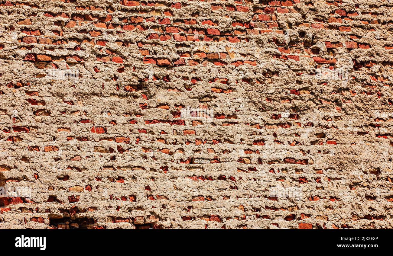 Die Textur der Steinmauer. Hintergrundstruktur der Steinmauer des alten Gebäudes. Steinmauer als Hintergrund oder Textur. Stockfoto Die Textur der Steinmauer. Hintergrundstruktur der Steinmauer des alten Gebäudes. Steinmauer als Hintergrund oder Textur. Stockfoto