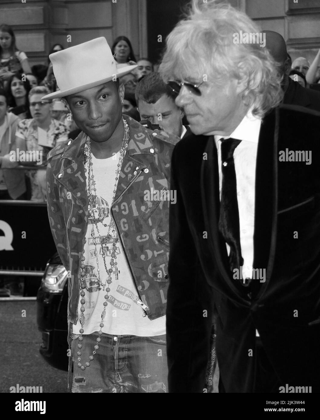 London, UK, 2.. September 2014: Pharrell Williams und Bob Geldof nehmen an den GQ Men of the Year Awards im Royal Opera House in London Teil. Stockfoto
