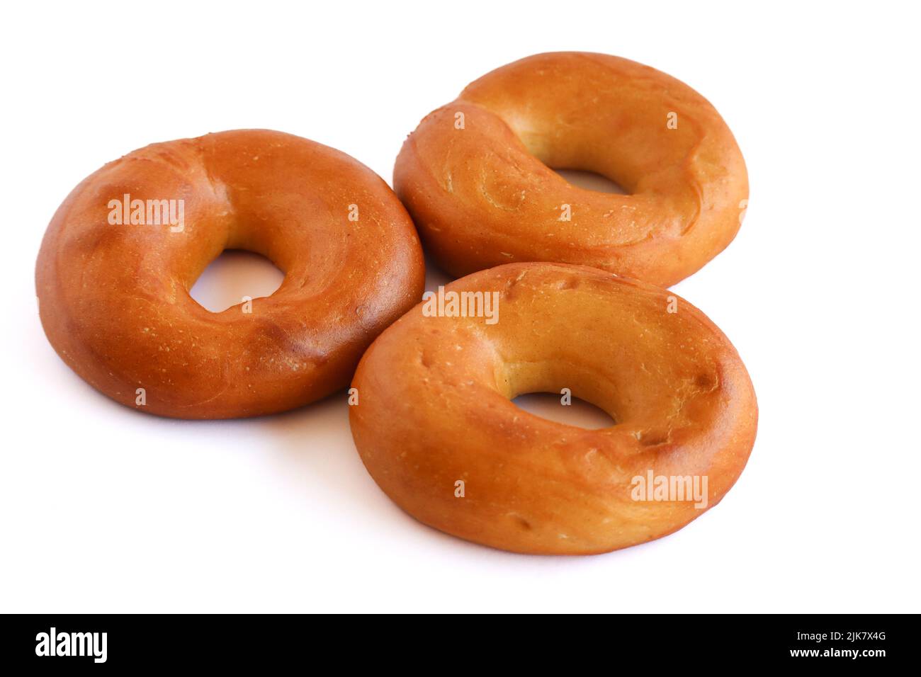 Bagels auf weißem Hintergrund. 3 Bagels Stockfoto