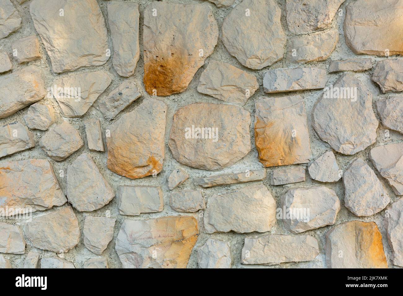Die Textur der Steinmauer. Hintergrundstruktur der Steinmauer des alten Gebäudes. Steinmauer als Hintergrund oder Textur Stockfoto Die Textur der Steinmauer. Hintergrundstruktur der Steinmauer des alten Gebäudes. Steinmauer als Hintergrund oder Textur Stockfoto