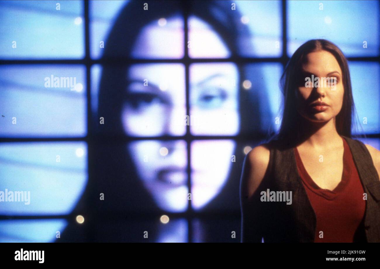 Angelina Jolie Film Cyborg 2 (1990) Charaktere: Casella 'Cash' Reese Regie: Michael Schroeder 24. November 1993 **WARNUNG** dieses Foto ist nur für redaktionelle Zwecke bestimmt und unterliegt dem Urheberrecht von TRIMARK PICTURES und/oder dem Fotografen, der von der Film- oder Produktionsgesellschaft beauftragt wurde, und kann nur durch Veröffentlichungen in Verbindung mit der Werbung für den oben genannten Film reproduziert werden. Eine obligatorische Gutschrift für TRIMARK PICTURES ist erforderlich. Der Fotograf sollte ebenfalls angerechnet werden, wenn er bekannt ist. Ohne schriftliche Genehmigung der Film Company kann keine kommerzielle Nutzung gewährt werden. Stockfoto