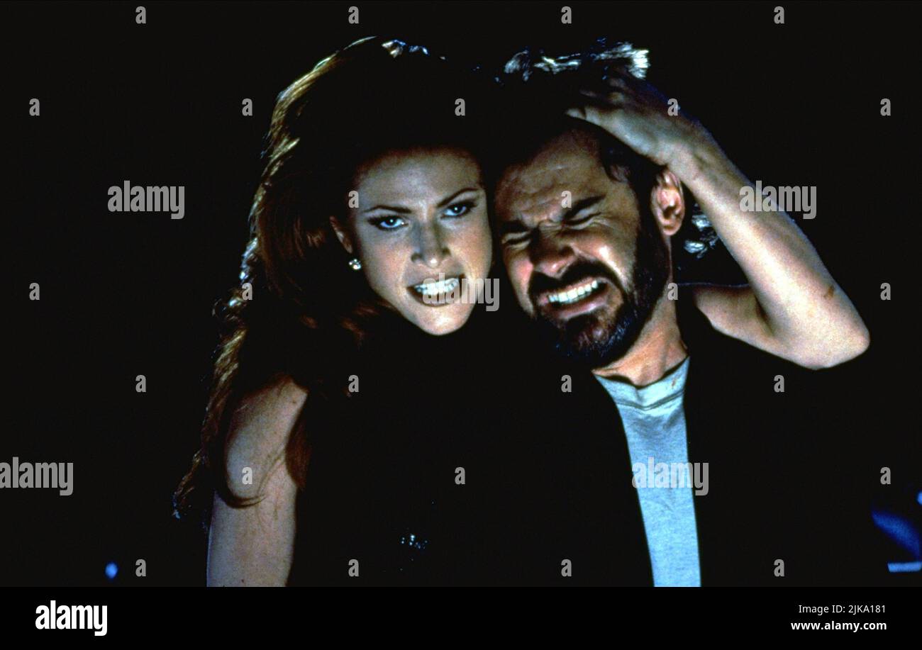 Angie Everhart & Dennis Miller Film: Bordello of Blood; Tales from the Crypt presents Bordello of Blood (USA 1996) Charaktere: Lilith, Rafe Guttman Regie: Gilbert Adler 16. August 1996 **WARNUNG** Dieses Foto ist nur für redaktionelle Verwendung bestimmt und unterliegt dem Copyright von UNIVERSAL CITY STUDIOS und/oder des Fotografen, der von der Film- oder Produktionsfirma beauftragt wurde und kann nur durch Publikationen im Zusammenhang mit der Bewerbung des oben genannten Films reproduziert werden. Eine obligatorische Gutschrift für UNIVERSAL CITY STUDIOS ist erforderlich. Der Fotograf sollte auch bei Bekanntwerden des Fotos gutgeschrieben werden. Es kann keine kommerzielle Nutzung gewährt werden Stockfoto