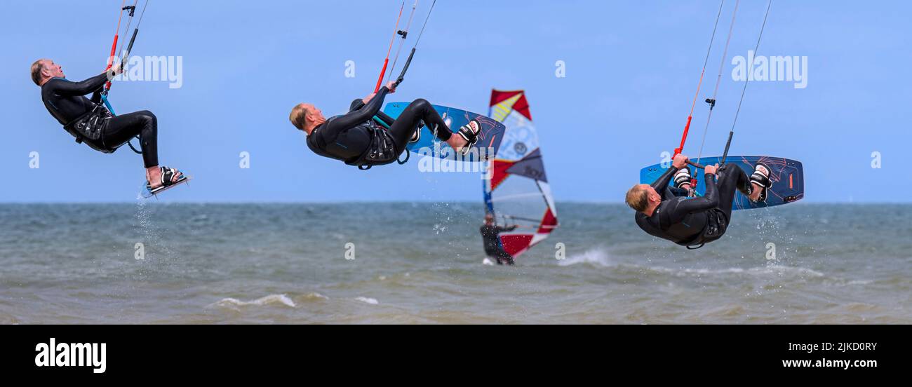 Kitesurfing Sequenz von Kiteboarder / Kitesurfer auf twintip Board springen auf der Nordsee an einem windigen Tag Stockfoto