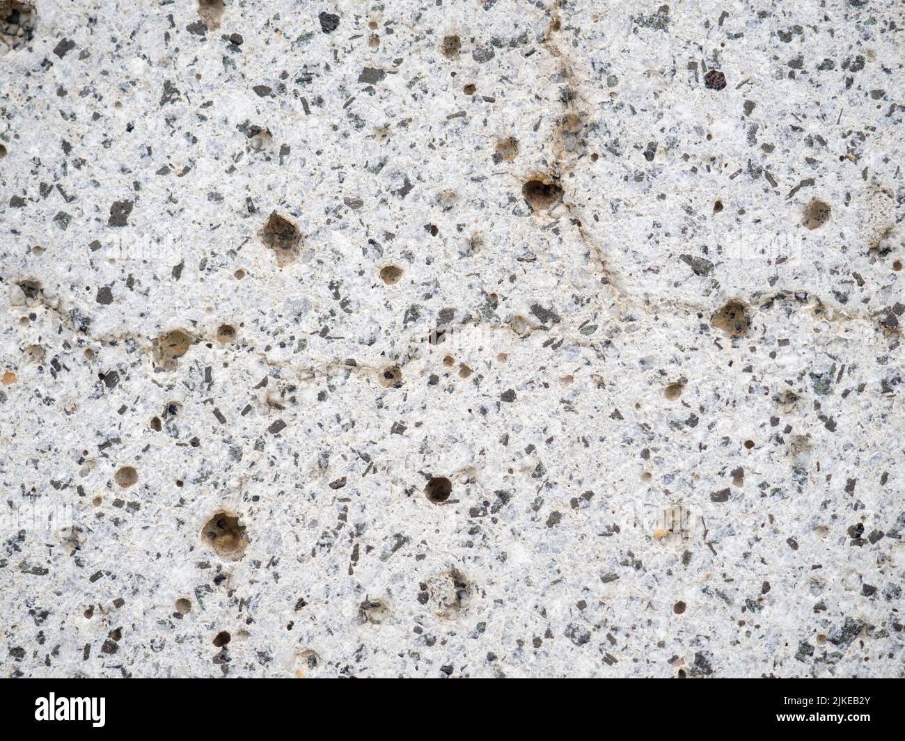 Poröse Steinoberfläche. Hintergrund aus Zement. Betonwand. Hintergrunddesign Stockfoto
