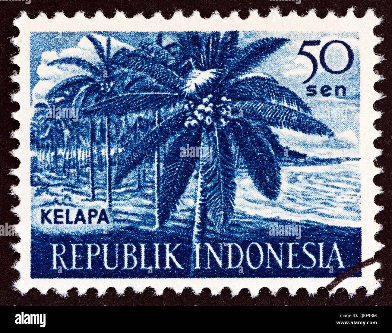 INDONESIEN - UM 1960: Eine in Indonesien gedruckte Marke aus der 'Agricultural Products'-Ausgabe zeigt Kokosnusspalme, um 1960. Stockfoto