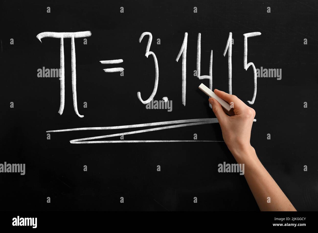 Handschrift Nummer Pi auf Tafel im Klassenzimmer Stockfoto