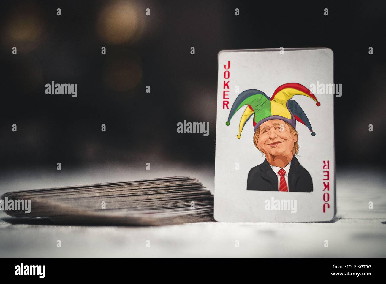 Eine Spielkarte im Vintage-Stil mit Donald Trump auf der Joker-Karte Stockfoto