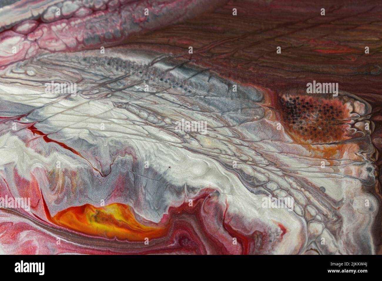 Die abstrakte Malerei mit Acryl mit Fluid Pour Stockfoto
