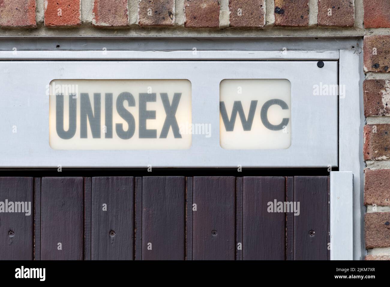 Unisex wc-Toilettenschild - Großbritannien Stockfoto