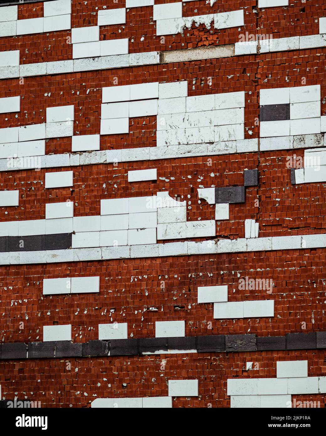 Eine Backsteinmauer mit bunten Fliesen auf dem Gebäude in Istanbul Stockfoto