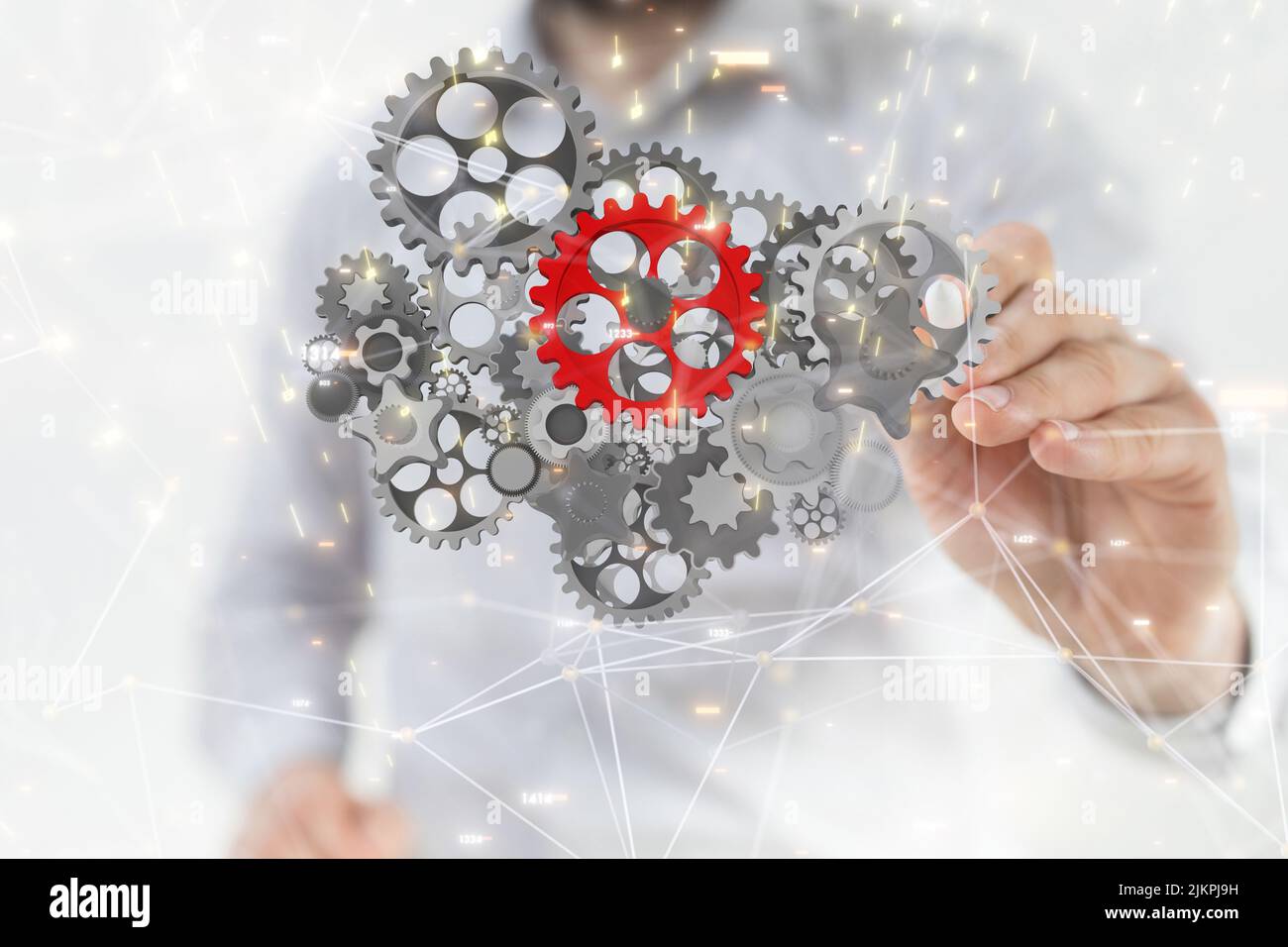 Ein Mann berührt 3D Getriebe-Symbole auf virtuellen Bildschirm Business-, Internet-und Technologie-Konzept. Stockfoto
