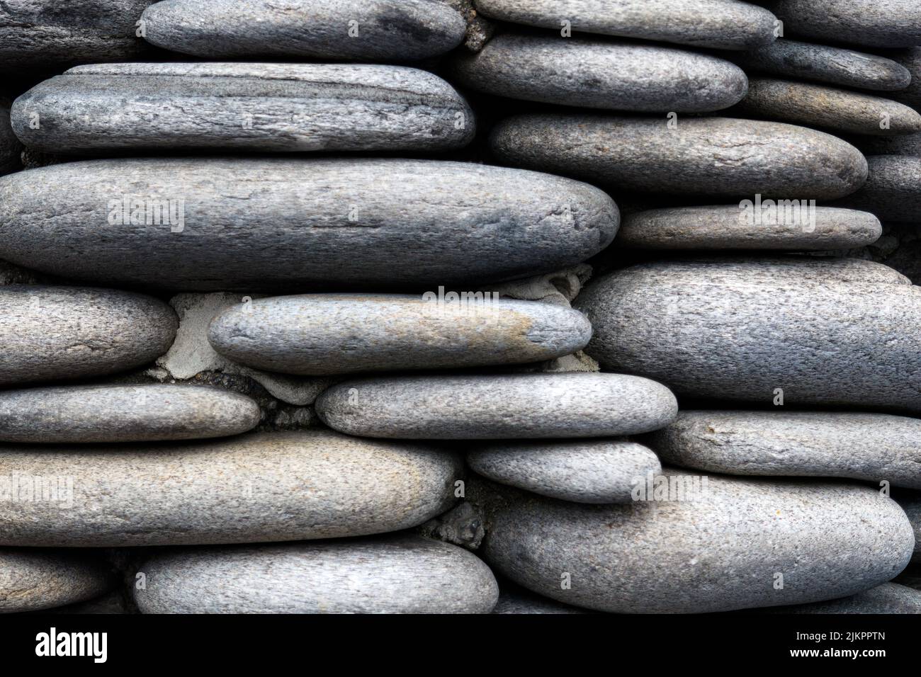 Eine Nahaufnahme von flachen Steinen - perfekt für den Hintergrund Stockfoto