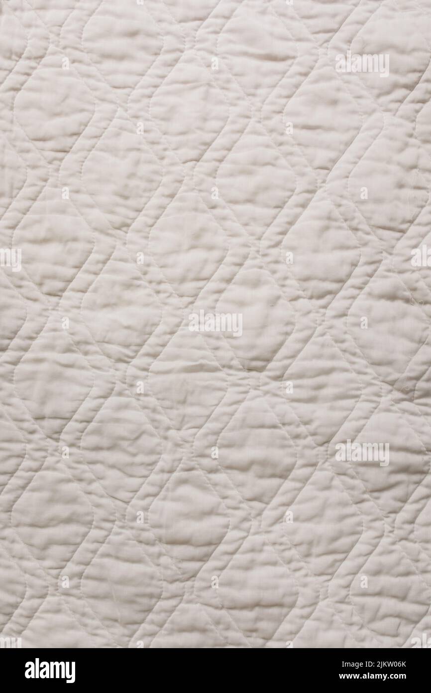 Gesteppte, diamantförmige Matratzenauflage, Decke, Textur Stockfoto