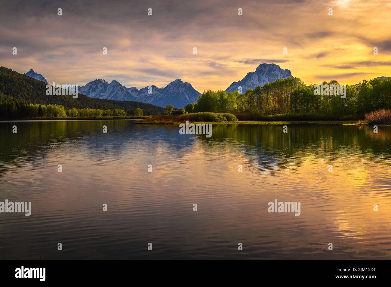 Sonnenuntergang über dem Oxbow Bend des Snake River im Grand Teton National Park, Wyoming Stockfoto