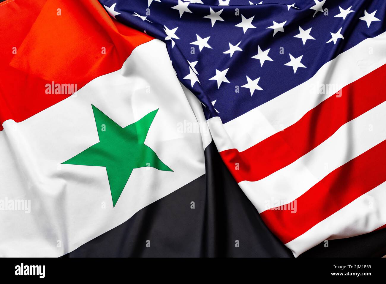 Flagge der Vereinigten Staaten von Amerika und Flagge Syriens zusammen Stockfoto