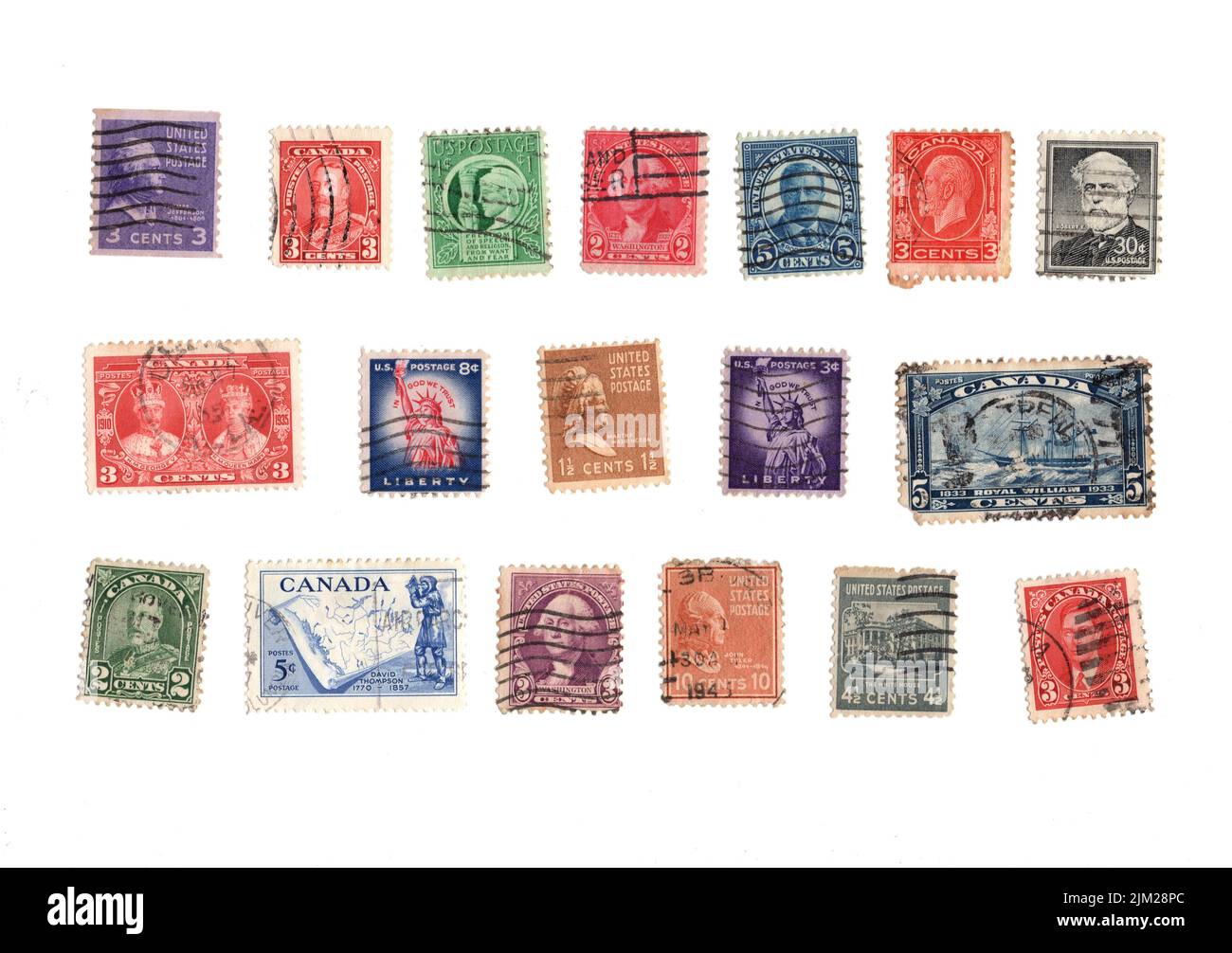 Eine Auswahl alter Briefmarken aus Nordamerika auf weißem Hintergrund. Stockfoto