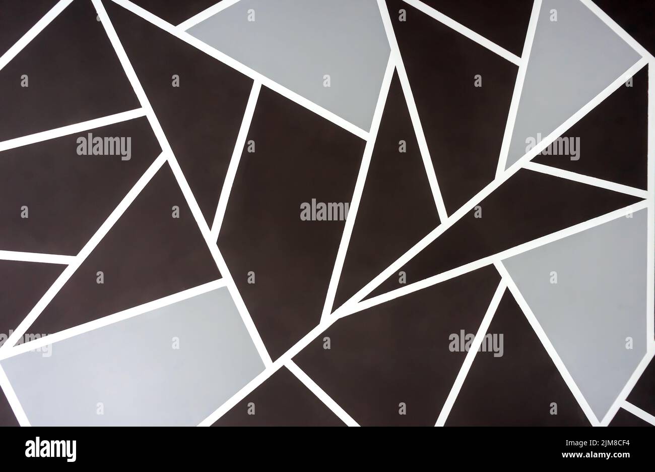 Abstrakter Hintergrund brauner und grauer geometrischer Formen Stockfoto