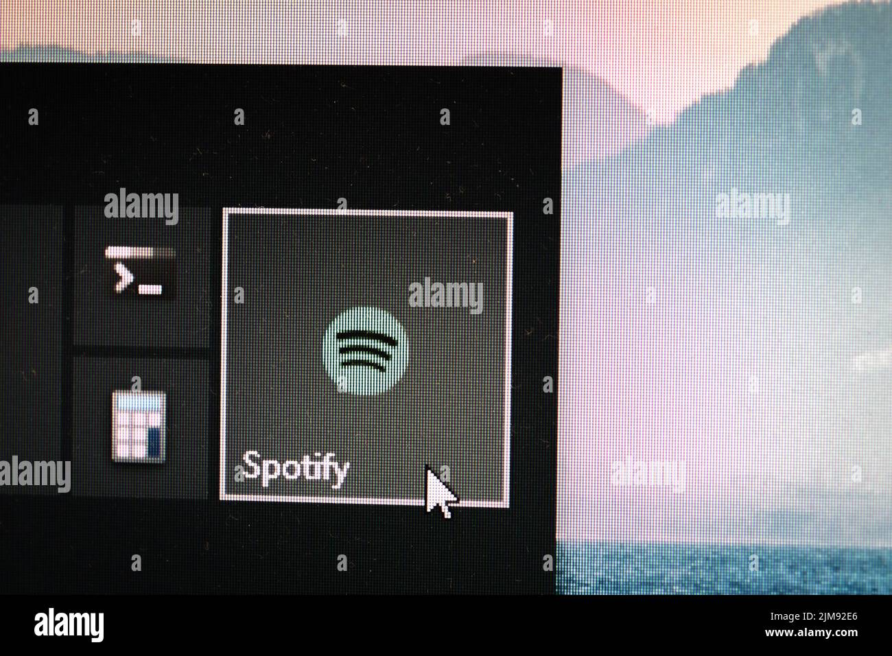 App-Symbol von Spotify auf einem Windows 10-Desktop Stockfoto