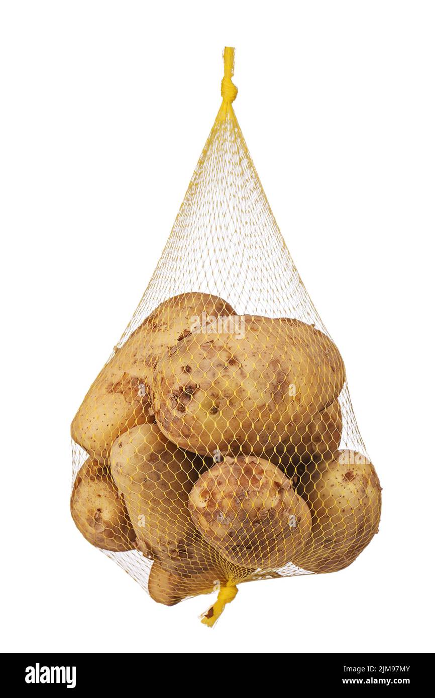 Rohe, faule, verdorbene, Bio-Kartoffeln im Netzbeutel. Stockfoto