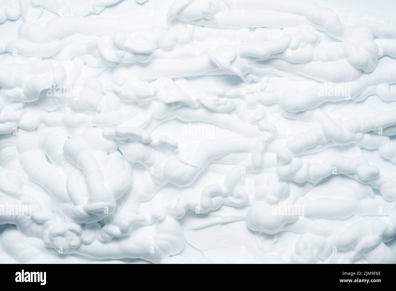 Weißer Schaumstoff Textur abstrakter Hintergrund Mousse Stockfoto