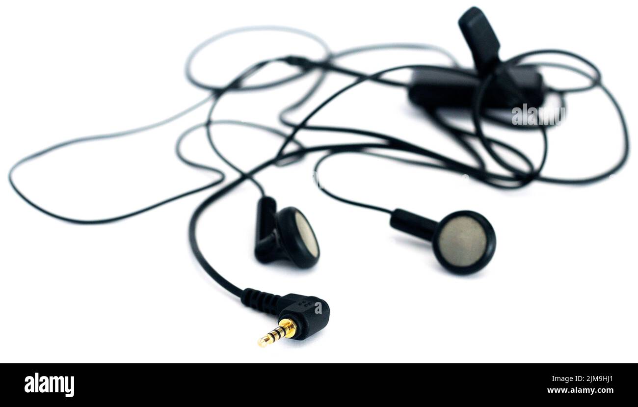 Kompakte Audio-Ohrhörer auf weißem Hintergrund Stockfoto