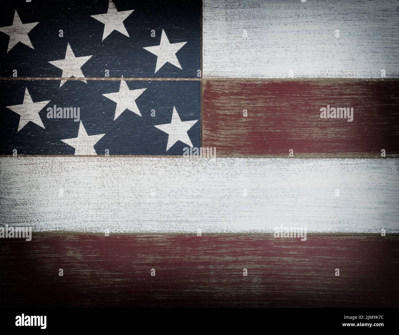USA National Colors bemalt auf verblasste Holzbretter mit Vignette-Effekt Stockfoto