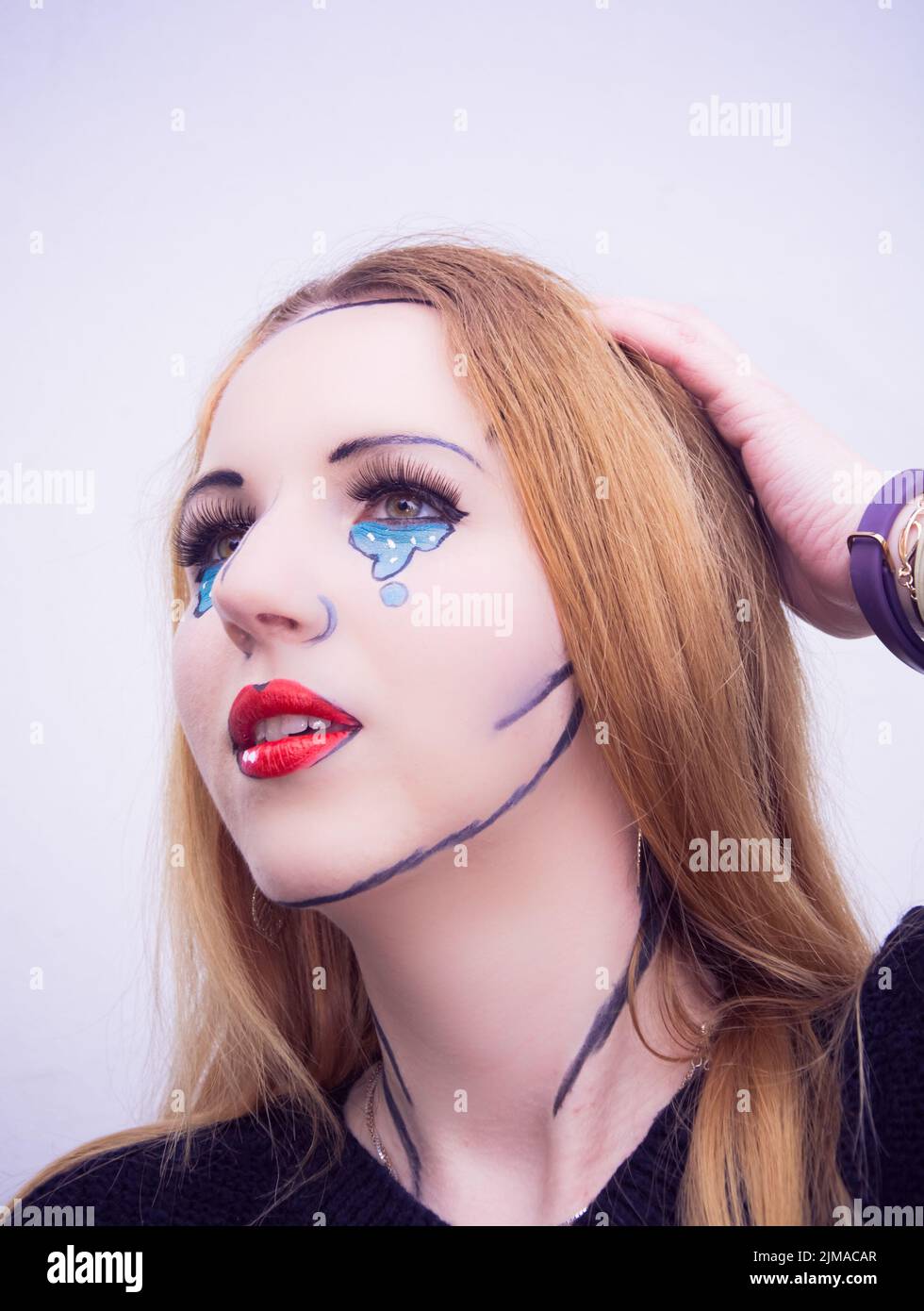 Hübsche junge Frau tragen kreative Make-up Stockfoto